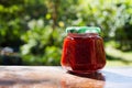 Fruit jam jar on a wooden table Royalty Free Stock Photo