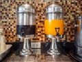 Fruit juice dispensers and coffee & tea water on a self service Royalty Free Stock Photo