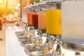 Fruit juice in water cooler for breakfast at the hotel Royalty Free Stock Photo