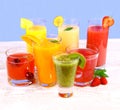 Fruit juices, kiwi, raspberries, cherry, orange, strawberry, pineapple Royalty Free Stock Photo