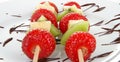 Fruit kebabs and chocolate