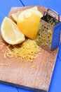 Fruit lemon fruit and lemon zest with grater Royalty Free Stock Photo