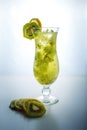 Fruit lemonade in hurricane glass with kiwi and lemon Royalty Free Stock Photo