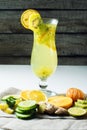 Fruit lemonade in hurricane glass with kiwi and lemon Royalty Free Stock Photo