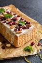 Fruit loaf with cranberries, almond and white chocolate topping Royalty Free Stock Photo