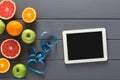 Fruit, measuring tape and blank tablet mockup Royalty Free Stock Photo