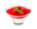 Raspberries  milk jelly in a ice cream bowl with mint leaves, isolated on a white background. Close-up. Royalty Free Stock Photo