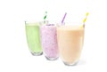 Fruit milk shakes on background