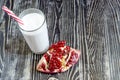 Fruit milkshakes with pomegranate in a transparent glass Royalty Free Stock Photo