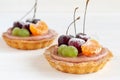 Fruit mini tartlets on white background Royalty Free Stock Photo