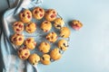 Fruit muffins on a cooling rack. Blueberry and strawberry muffins Royalty Free Stock Photo