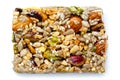 Fruit, nut and seed bar with pistachios isolated on white from a Royalty Free Stock Photo