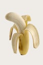 One half unpeel Banana on white background Royalty Free Stock Photo