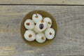 Fruit peeled lychee in black bowl on wooden table Royalty Free Stock Photo