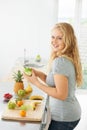 Fruit, peeling apple or portrait of woman with a morning snack, breakfast meal or diet in kitchen at home. Healthy lunch Royalty Free Stock Photo