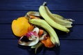 Fruit peeling on a black background.