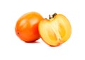 Fruit persimmons with half Royalty Free Stock Photo