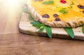 Fruit pizza with pineapple, orange, kiwi, cherry Royalty Free Stock Photo