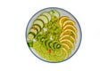 Fruit plate with grapes, kiwi, lime, pear and orange, sliced pieces on a white background, isolated Royalty Free Stock Photo