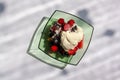 Fruit plate in the style of a flat lay with beautiful diagonal shadows on a white background.