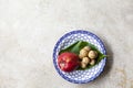 Fruit plate on white stone table Royalty Free Stock Photo