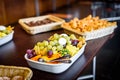 Fruit platter bowl buffet at business or wedding event venue.