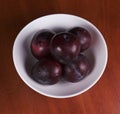 Fruit plum in plate Royalty Free Stock Photo