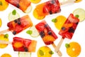 Fruit popsicles, homemade fruit ice lolly of various fruits, top view