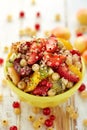 Fruit salad with the addition of quinoa, honey, lemon juice and fresh mint Royalty Free Stock Photo