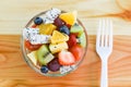 Fruit salad bowl fresh summer fruits and vegetables healthy organic food strawberries orange kiwi blueberries dragon fruit Royalty Free Stock Photo