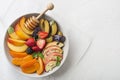 Fruit salad with apple, plum, apricot and peach Royalty Free Stock Photo