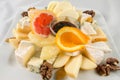 Fruit salad with cheese and nuts. Royalty Free Stock Photo