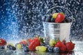 Fruit salad close up in metal bucket. Strawberry, grape, blueberry multivitamin cocktail. Healthy lifestyle. Summer diet. Set of f
