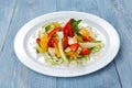 Fruit salad closeup, vegan food at wood Royalty Free Stock Photo
