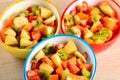 Fruit salad in colorful bowls Royalty Free Stock Photo