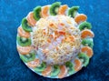 Fruit salad with fried prawns shrimps, persimmon, red onion and lettuce in white bowls. Appetizers, snack, brunch Royalty Free Stock Photo