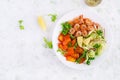 Fruit salad with fried prawns / shrimps, persimmon, red onion and lettuce in white bowls. Royalty Free Stock Photo