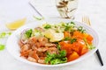 Fruit salad with fried prawns / shrimps, persimmon, red onion and lettuce in white bowls. Royalty Free Stock Photo