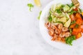 Fruit salad with fried prawns / shrimps, persimmon, red onion and lettuce in white bowls Royalty Free Stock Photo