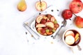 Fruit salad, healthy breakfast with ingredients, yogurt with muesli, apples, pears and grapes on a light table. The concept of