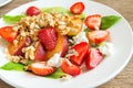 Fruit salad with homemade granola Royalty Free Stock Photo