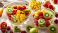 fruit salad kiwi, apple, mango summer , food strawberries nutritive glass dessert bowls, in the kitchen healthy