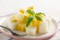 Fruit salad. Mango and melon with Basil Royalty Free Stock Photo