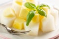 Fruit salad. Mango and melon with Basil Royalty Free Stock Photo