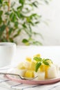 Fruit salad. Mango and melon with Basil Royalty Free Stock Photo