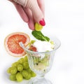 Fruit salad with mint and sour cream Royalty Free Stock Photo