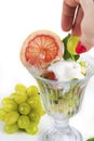 Fruit salad with mint and sour cream Royalty Free Stock Photo