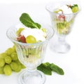 Fruit salad with mint and sour cream Royalty Free Stock Photo