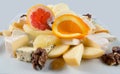Fruit salad with nuts, raisins and cheese. Royalty Free Stock Photo