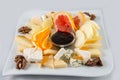 Fruit salad with nuts, raisins and cheese. Royalty Free Stock Photo